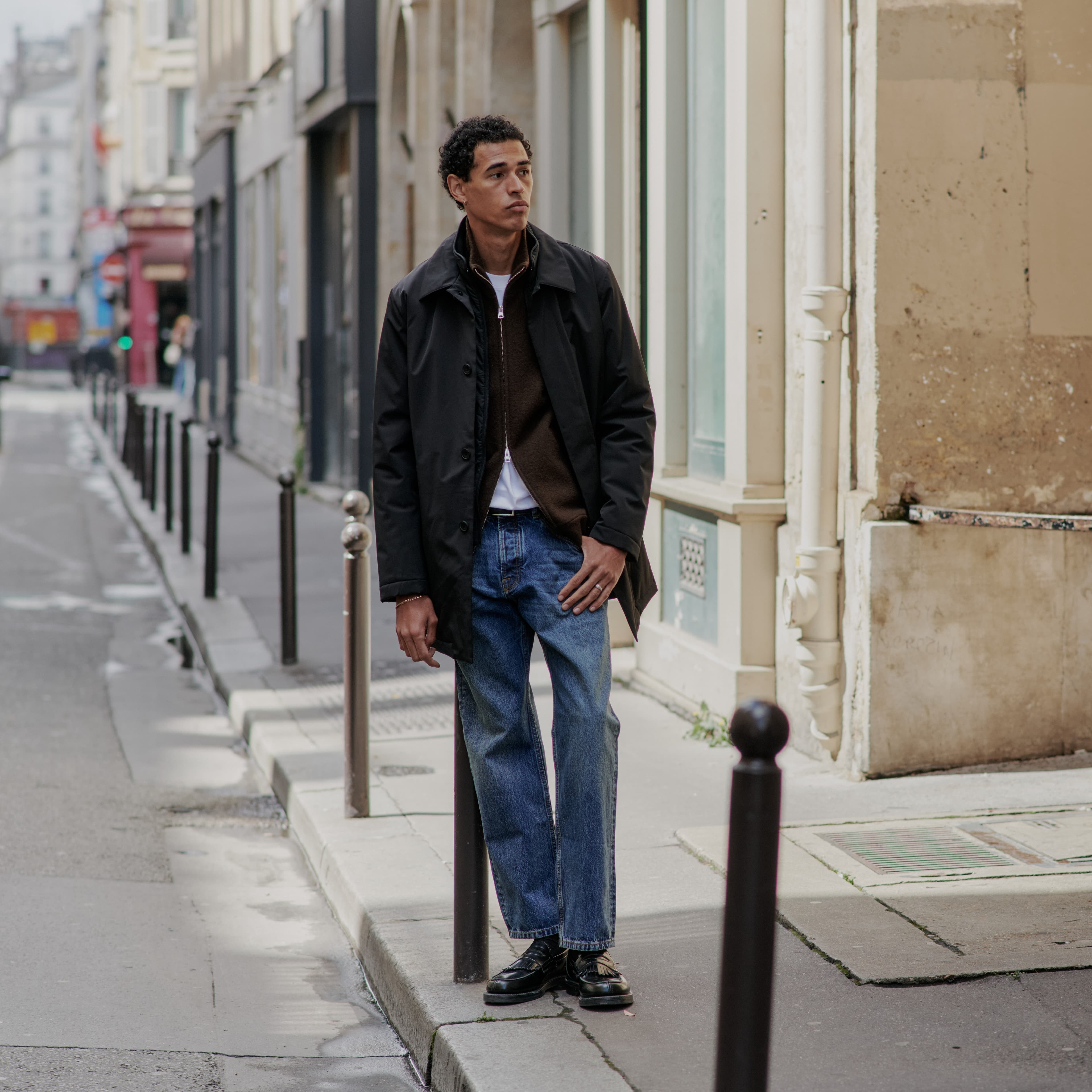 Premium menswear campaign image for the NN07 strategy section.